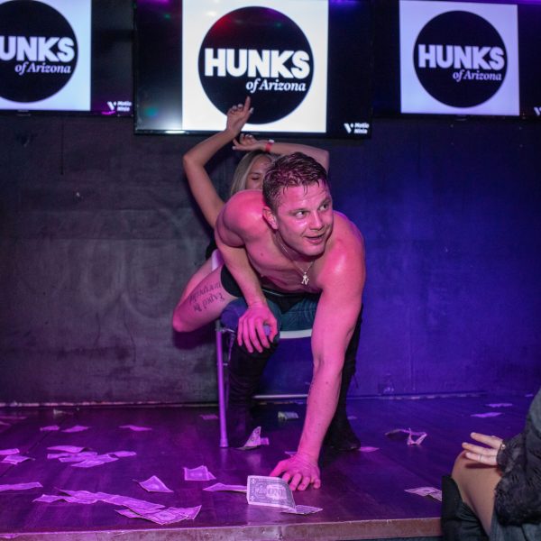 a man and a woman standing on a stage