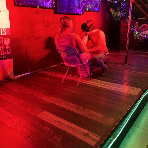 a person sitting on a stage