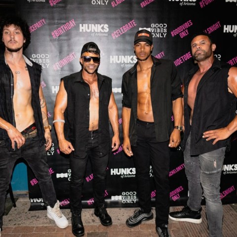 a group of people posing for the camera