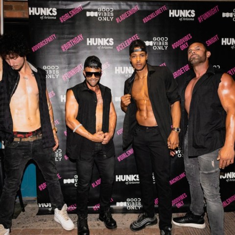 a group of people posing for a photo