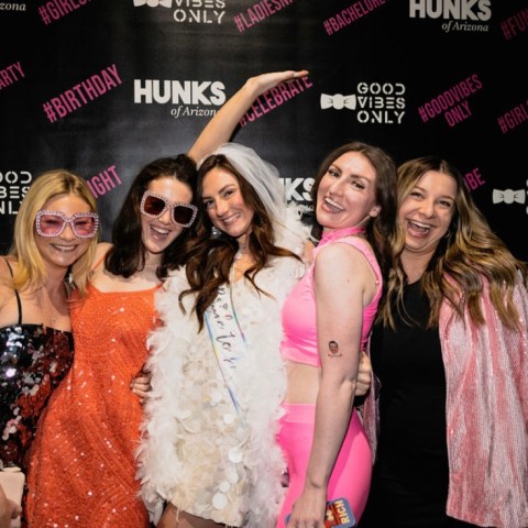 a group of people posing for the camera