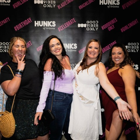 a group of people posing for a photo